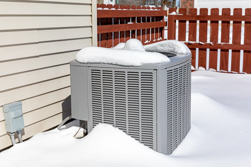 AC Condenser HVAC System Winter Snow