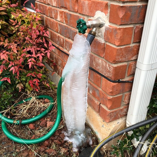 Frozen pipe with garden hose