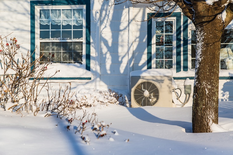 Heat pump in winter snow