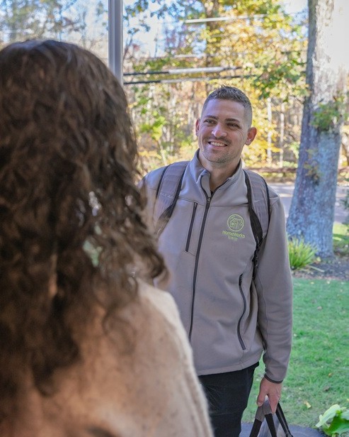 Home Energy Specialist arrives for a no-cost Mass Save Home Energy Assessment in Massachusetts
