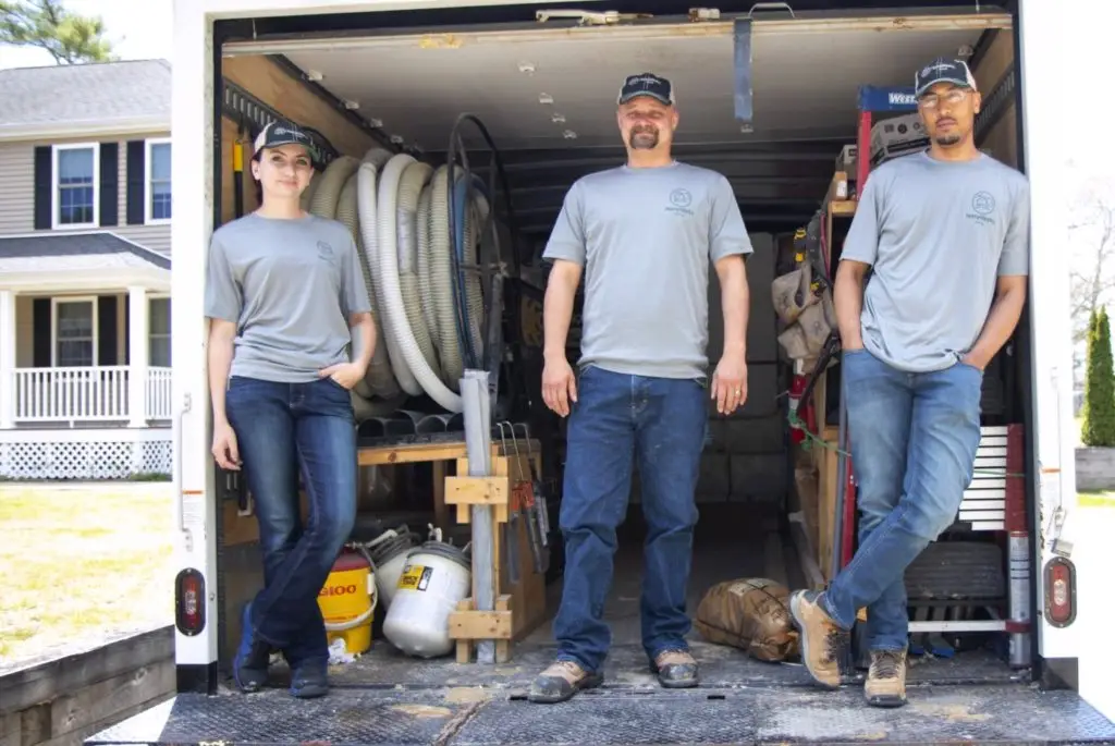 Home Energy Specialists on a HomeWorks Truck