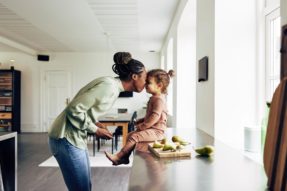 Mother and daughter enjoying an energy-efficient home thanks to Mass Save